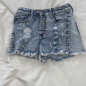 blue/bleached ripped jean shorts.